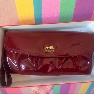 Coach Glossy Maroon Wristlet in EUC